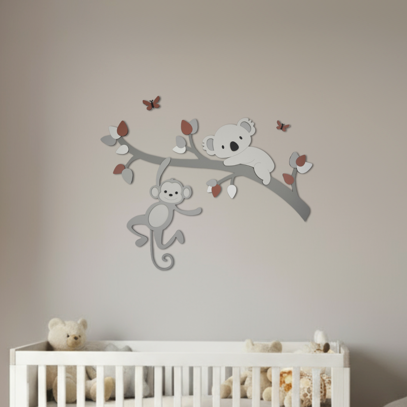 muurstickers voor babykamer; tak met gekleurde bladeren, koala en aapje.