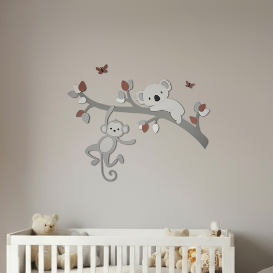 muurstickers voor babykamer; tak met gekleurde bladeren, koala en aapje.