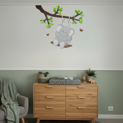 Houten muurstickers voor kinderkamer, tak met groene bladeren en schommelend olifantje