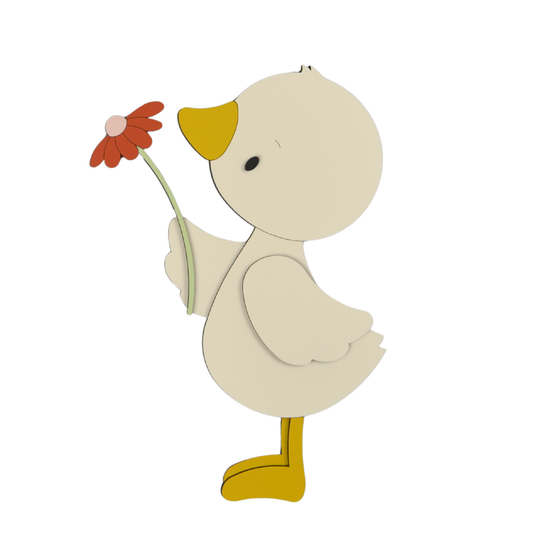 Houten muursticker voor de babykamer van schattig eendje met bloem.
